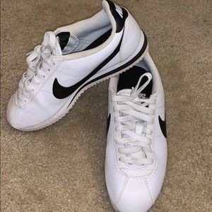 Black and white nike Cortez